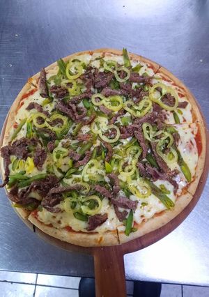 Una foto de Pizza al estilo chacarero