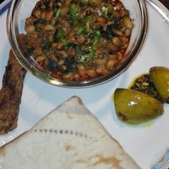 White Lobia With Roti Homemade Achar and Seekh Kabab A picture of White Lobia With Roti Homemade Achar and Seekh Kabab.