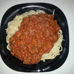 Una foto de Espaguetis con salsa boloñesa
