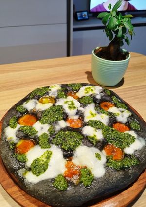 A picture of Tricolor Focaccia 🌿⚪🍅.