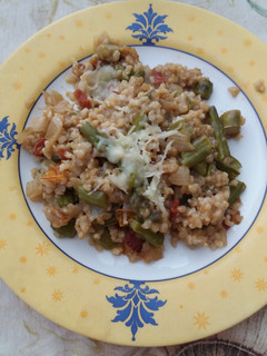 Una foto de Risotto espárragos y tomate seco🍅