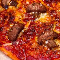 Una foto de Pizza de Champiñón Calavera #Halloween