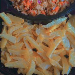 A picture of Chips with scramble egg by Binnur's kitchen kn.