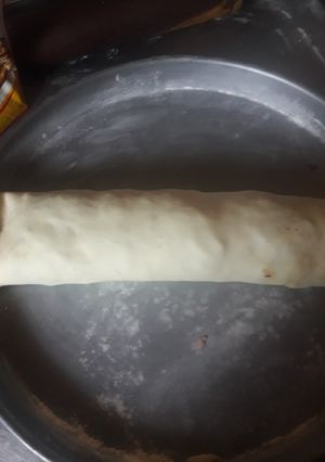 Una foto de Arrollado de jamón y queso