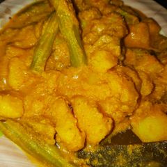 A picture of Drumstick Posto Aloo.