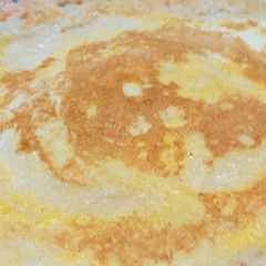 A picture of Mutta Dosa (egg dosa).