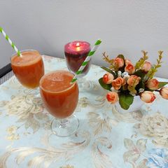 A picture of Orange and carrot juice.