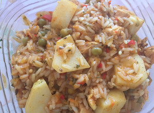 Una foto de Guiso de arroz con pollo