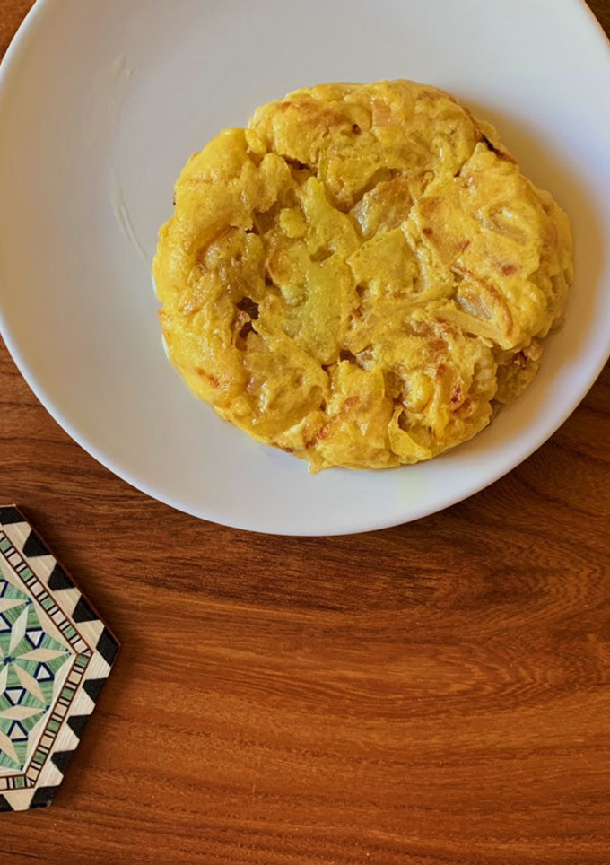 Una foto de Tortilla de patatas pequeña y jugosa