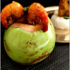 A picture of Daab Chingri Prawn Curry Within Tender Coconut.