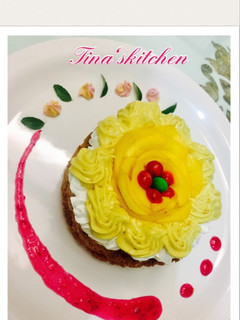 A picture of Ghewar with mango rabdi mousse.