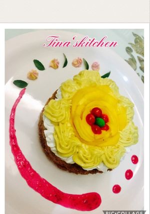 A picture of Ghewar with mango rabdi mousse.