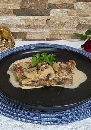 Una foto de Entrecote a la crema de hongos