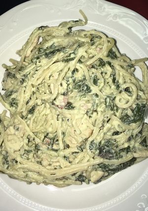 A picture of Basil pesto chicken pasta.