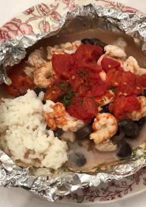 Una foto de Papillote de langostinos y pescado