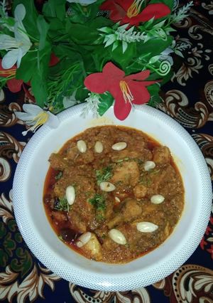 A picture of Chicken badami karahi.