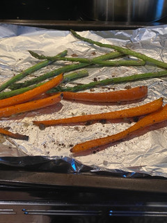 A picture of Roasted carrots and asparagus.