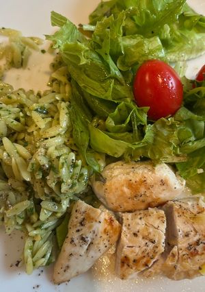 A picture of Lemon garlic chicken tender with orzo with pesto.