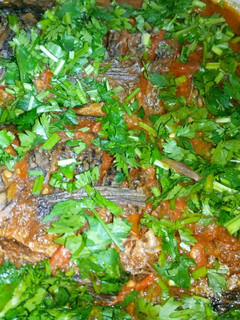 A picture of Wet fried tilapia fish.