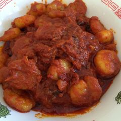 A picture of Spicy chilli masala prawns (singapore style).