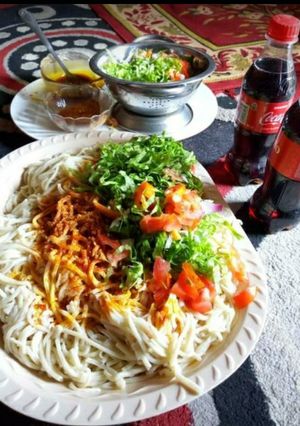 A picture of Native spaghetti with palm oil.