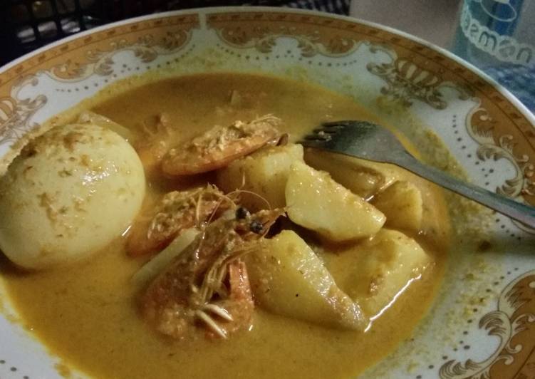 Bagaimana Membuat Gulai Cumi Udang, Enak