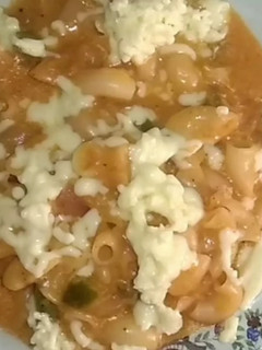 A picture of Macroni In Tomato Sauce.