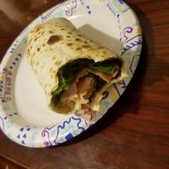 A picture of BLT Avacado Turkey wrap.