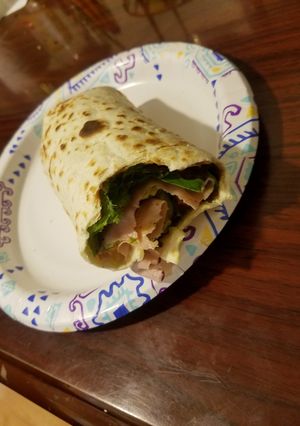 A picture of BLT Avacado Turkey wrap.