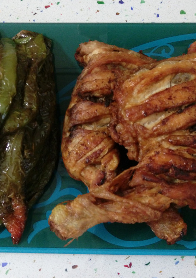 Una foto de Traseros de pollo y pimientos fritos