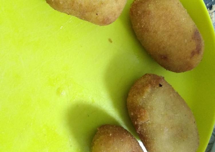 Croquetas de codillo con cabeza de lomo y cebolla caramelizada