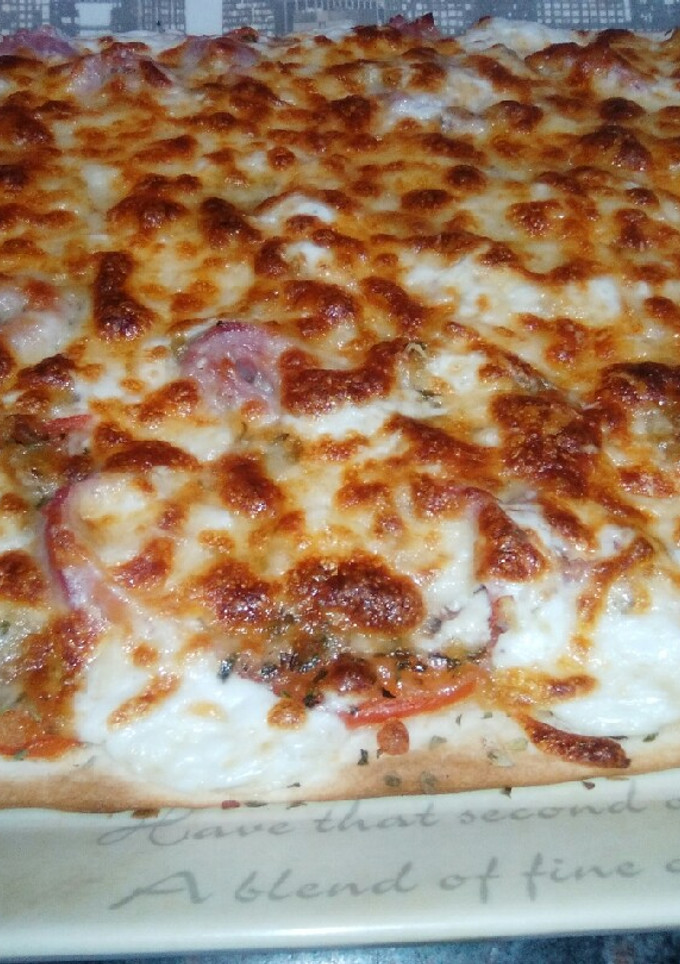 Una foto de Pizza carbonara