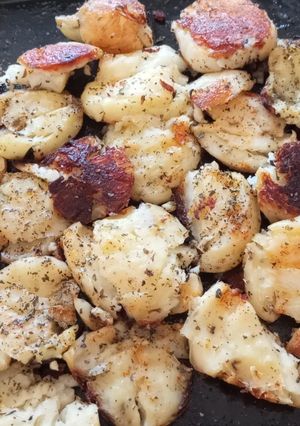 Una foto de Papas aplastadas al horno