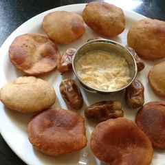 A picture of Sweet Banana Pooris With Sewain Kheer.