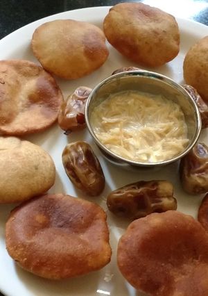 A picture of Sweet Banana Pooris With Sewain Kheer.