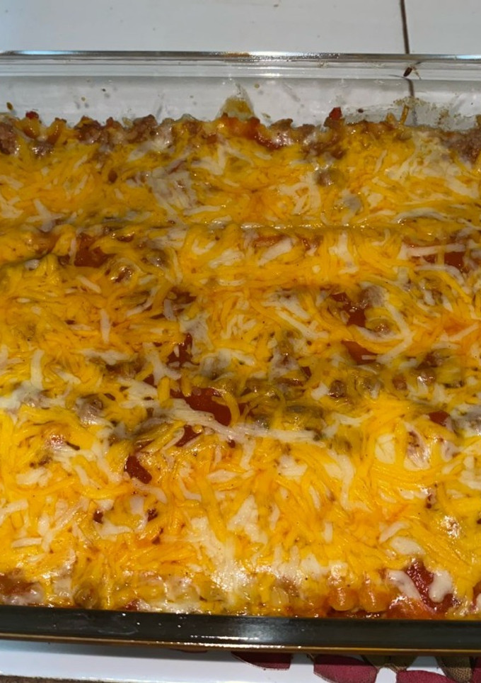 Una foto de Lasaña de carne molida en salsa roja