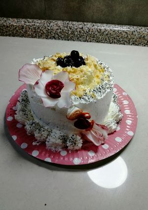 Una foto de Torta de arándanos y coco