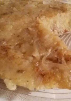 Una foto de Tortilla de papa y cebolla - Vegano
