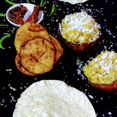 A picture of Niramish khichuri and beguni rainy season special.