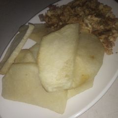 A picture of Fried yam with Egg sauce.