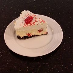 A picture of White Chocolate Cherry Truffle Cheesecake.