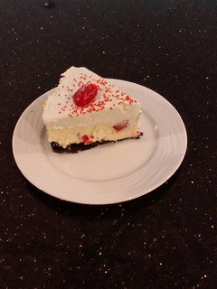 A picture of White Chocolate Cherry Truffle Cheesecake.