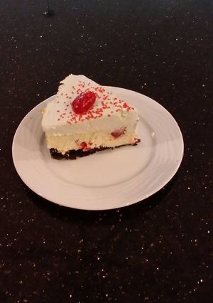 A picture of White Chocolate Cherry Truffle Cheesecake.