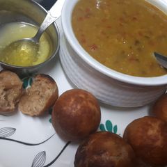 A picture of Dal baatis in appe pan.