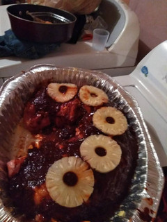 Una foto de Lomo relleno frutos secos con chile colorado
