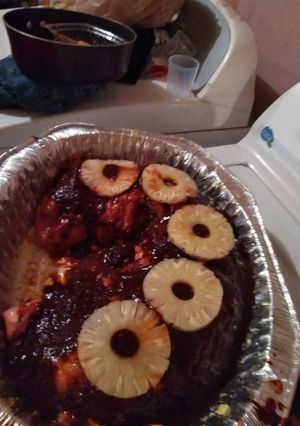 Una foto de Lomo relleno frutos secos con chile colorado