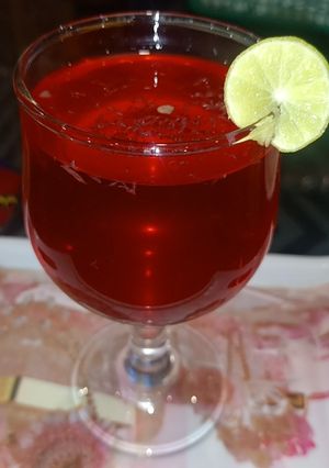 A picture of RoohAfza with lemon.
