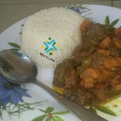 A picture of White rice and curry stew.