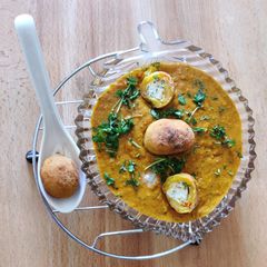 A picture of Paneer Kofta with Makhni Gravy.