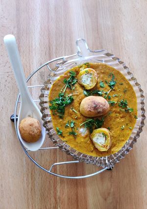 A picture of Paneer Kofta with Makhni Gravy.